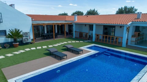 Property building, Patio, Pool view, sunbed