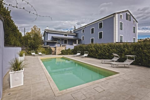 Property building, Pool view, Swimming pool, sunbed