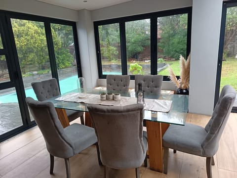 Seating area, Dining area, Pool view