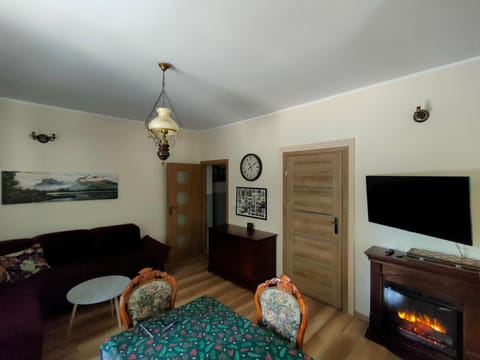 TV and multimedia, Living room, Seating area, Evening entertainment, fireplace, wardrobe