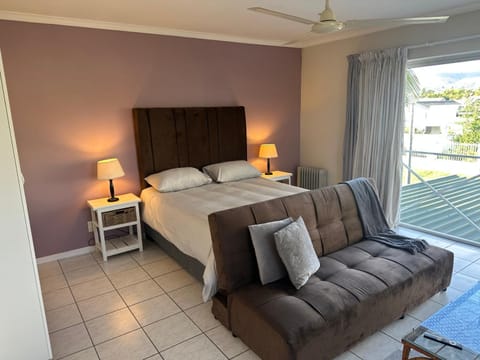 Bed, Living room, Seating area, Bedroom