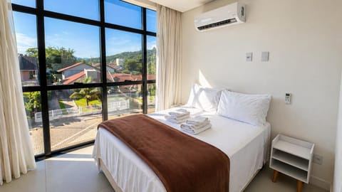 Bed, Photo of the whole room, Bedroom, towels, air conditioner