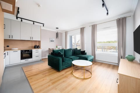 TV and multimedia, Kitchen or kitchenette, Living room, Seating area, Dining area, dishwasher, stove