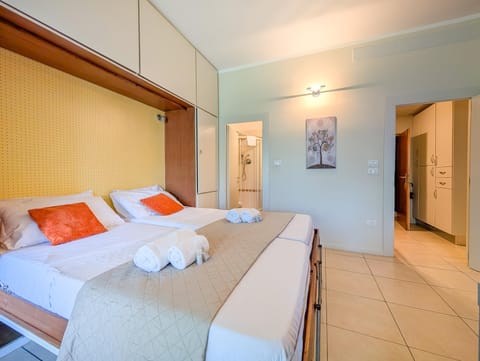 Bed, Photo of the whole room, Bedroom, towels, wardrobe