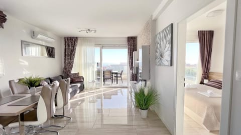 TV and multimedia, Living room, Seating area, Dining area, Sea view