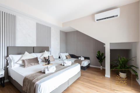 Bed, Photo of the whole room, Bedroom, towels, air conditioner