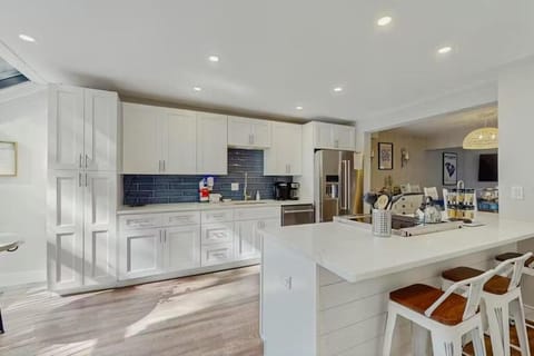 Kitchen or kitchenette, dishwasher, oven, stove, toaster