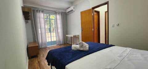 Bed, Photo of the whole room, Bedroom, towels, wardrobe, air conditioner