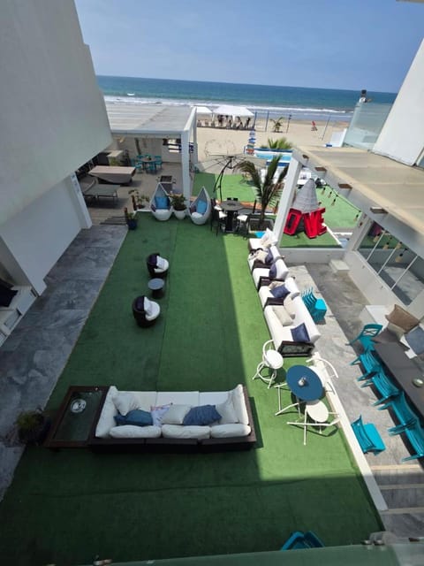 Patio, Natural landscape, Living room, Beach, Sea view, sunbed