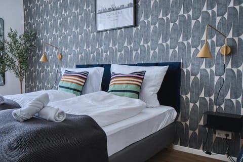 Bed, Living room, Seating area, Bedroom