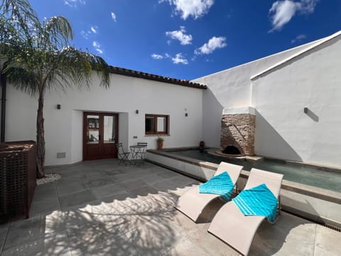 Patio, Seating area, Swimming pool, sunbed