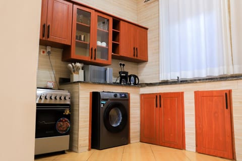 Kitchen or kitchenette, oven, stove, washing machine, kitchen