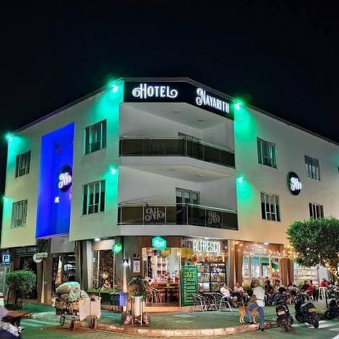 Communal lounge/ TV room, Night, Property logo or sign, City view, Street view