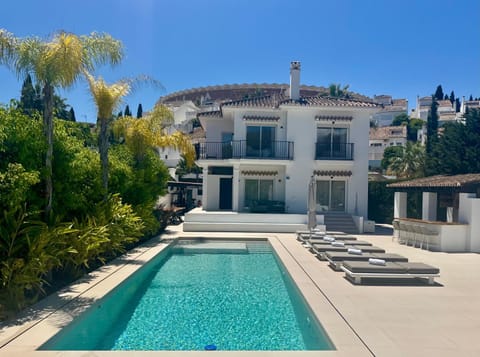 Property building, Patio, Day, Pool view, Swimming pool