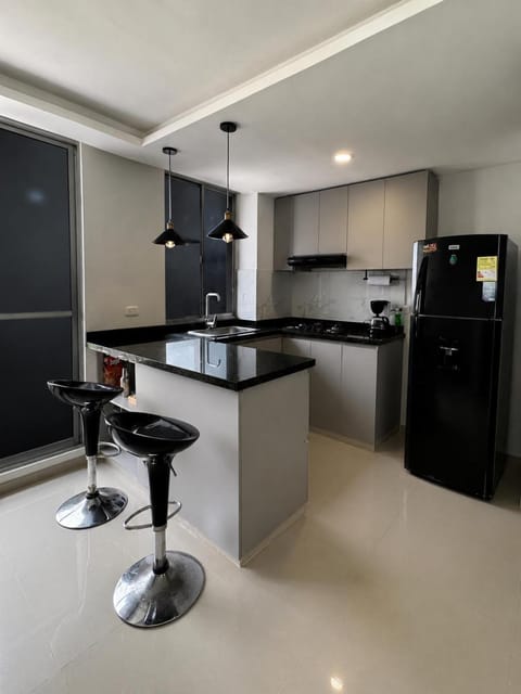 Kitchen or kitchenette, minibar