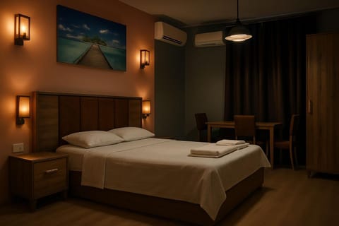 Bed, Photo of the whole room, Bedroom, towels, air conditioner