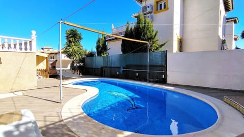 Property building, Living room, Swimming pool