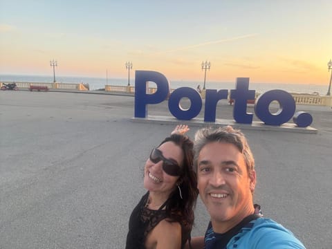 Nearby landmark, Day, People, Neighbourhood, Natural landscape, Beach, Logo/Certificate/Sign, Text overlay, Guests, Sea view, Street view, Sunset, group of guests