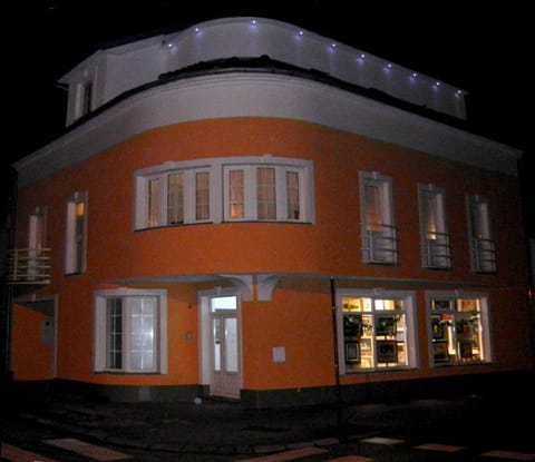 Property building, Facade/entrance, Night, On-site shops