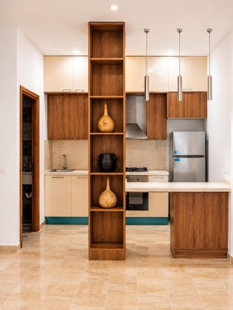 Kitchen or kitchenette, dishwasher, oven, stove