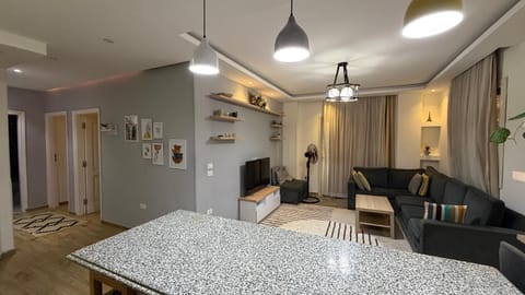 Kitchen or kitchenette, Living room, Seating area, Dining area