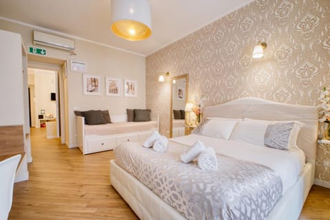 Bed, Photo of the whole room, Bedroom, towels, air conditioner