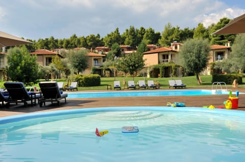 Property building, Patio, Nearby landmark, Spring, Day, People, Neighbourhood, Natural landscape, Activities, Activities, Summer, Garden, Food and drinks, Other, Kids's club, Evening entertainment, Guests, City view, Garden view, Landmark view, Pool view, Street view, Swimming pool, Family, furniture, internet, room service, sunbed, towels, VIP, VIP, wedding, wedding, air conditioner