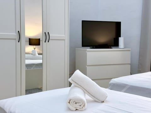 Bed, TV and multimedia, Bedroom, towels, wardrobe