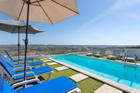 Property building, Living room, Swimming pool