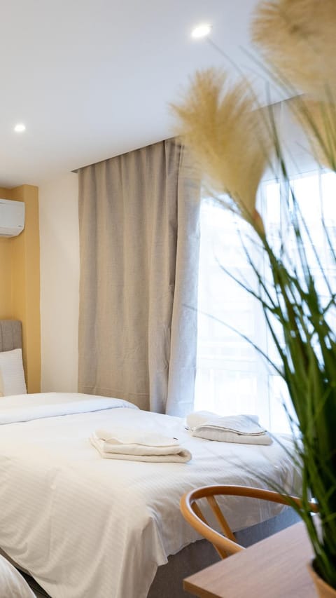 Bed, Photo of the whole room, Bedroom, towels, air conditioner