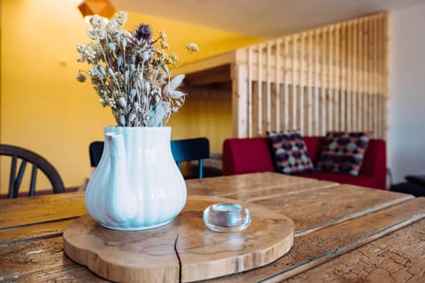 Bed, Living room, Seating area, Dining area
