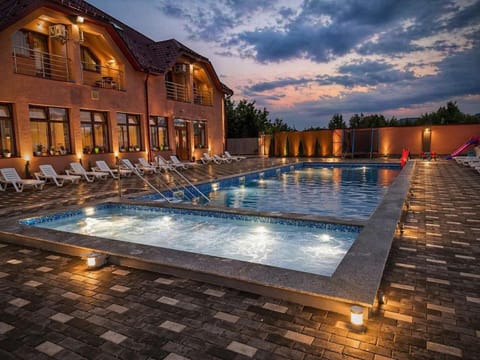 Property building, Swimming pool, Swimming pool, sunbed