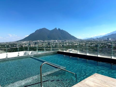 Nearby landmark, Day, Natural landscape, Mountain view, Pool view, Swimming pool, sunbed