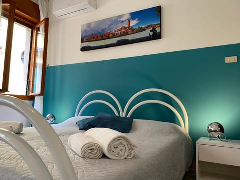 Bed, Photo of the whole room, Bedroom, towels, air conditioner