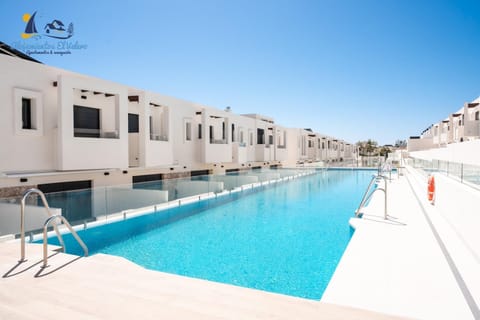 Property building, Pool view, Swimming pool, sunbed