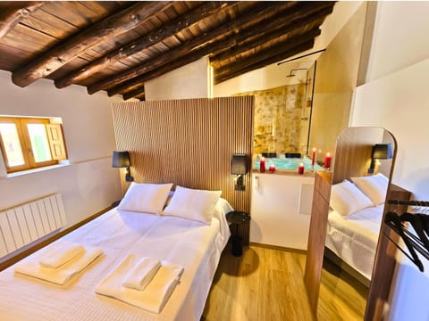 Bed, Hot Tub, Photo of the whole room, Bedroom, towels, wardrobe