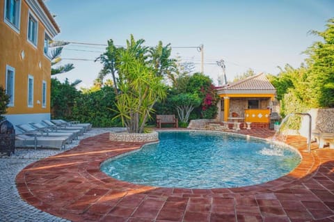 Property building, Natural landscape, Garden, Garden view, Pool view, Swimming pool