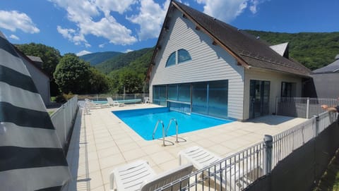Property building, Living room, Swimming pool
