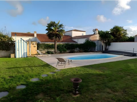 Property building, Living room, Swimming pool