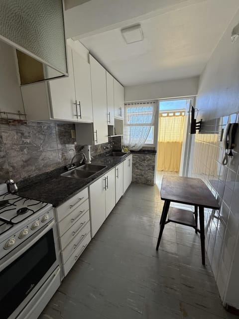 Kitchen or kitchenette, oven, stove