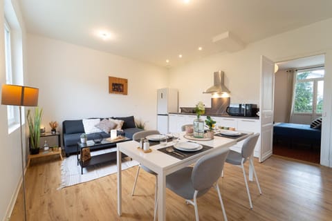 Living room, Dining area, microwave, stove, kitchen, air conditioner