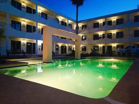 Property building, Night, Pool view, Swimming pool, sunbed