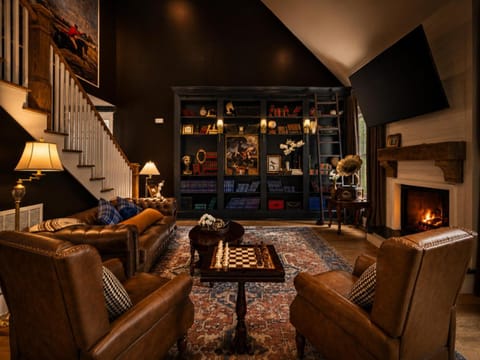 Communal lounge/ TV room, Library, Seating area, fireplace