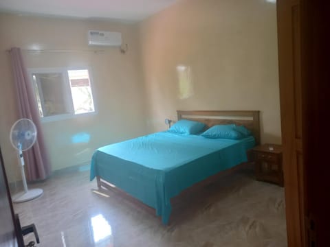 Photo of the whole room, air conditioner