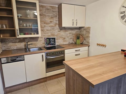 Kitchen or kitchenette, oven, stove