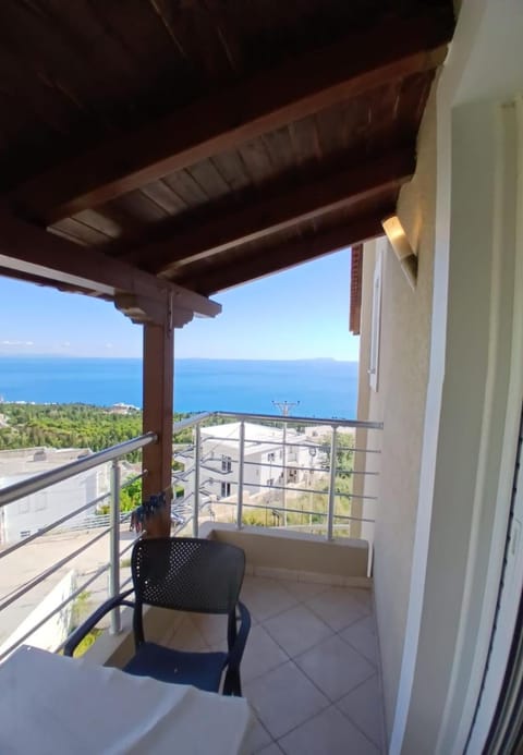 Property building, Patio, Day, Natural landscape, View (from property/room), Balcony/Terrace, Seating area, Dining area, Beach, Sea view