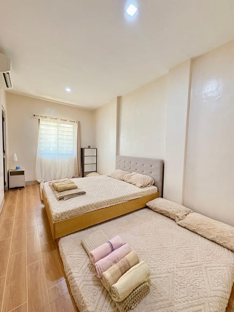 Bed, Photo of the whole room, Bedroom, towels, air conditioner
