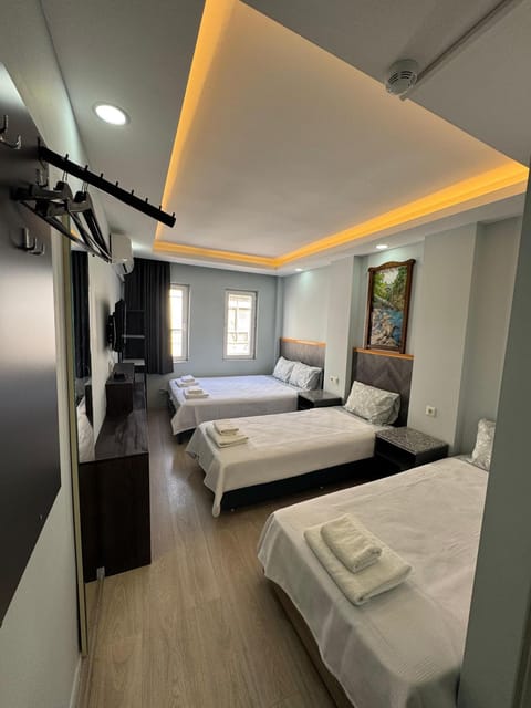 Bed, towels, air conditioner