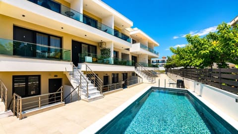 Property building, Day, View (from property/room), Balcony/Terrace, Pool view, Swimming pool