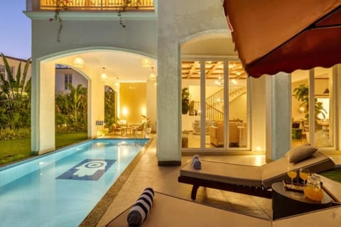 Patio, Natural landscape, Living room, Seating area, Pool view, Swimming pool, sunbed